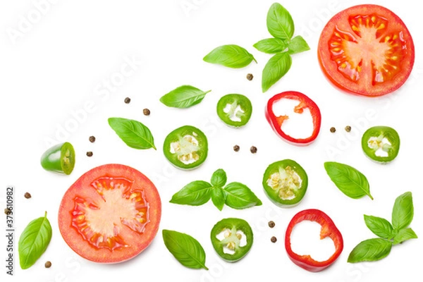 Fototapeta fresh tomato slices with green pepper and basil leaves isolated on white background. top view