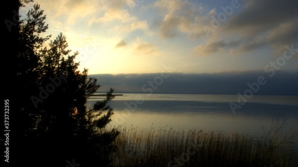 Fototapeta sunset over the river