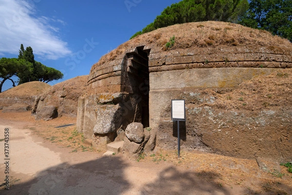 Fototapeta Cervetery Necropoli, the entrance to an ancient Etruscan tomb, Etruscan necropolis, Cerveteri Rome Province, Italy.Ancient Etruscan city, The necropolis of Banditaccia located on a tuffaceous hill.