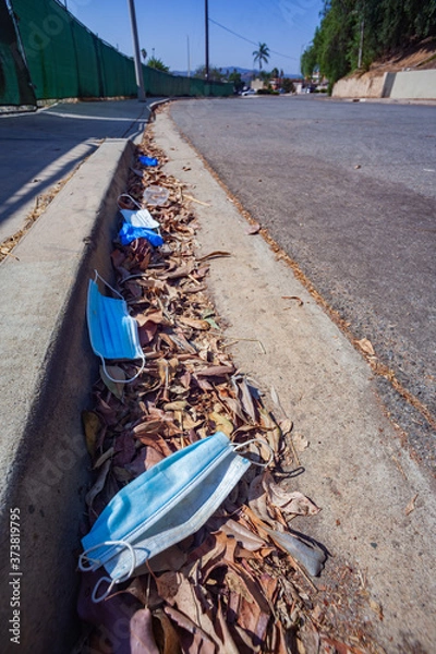 Fototapeta Covid Trash in the Gutter #3