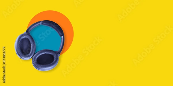 Fototapeta Wireless headphone with abstract background - Bluetooth headset 