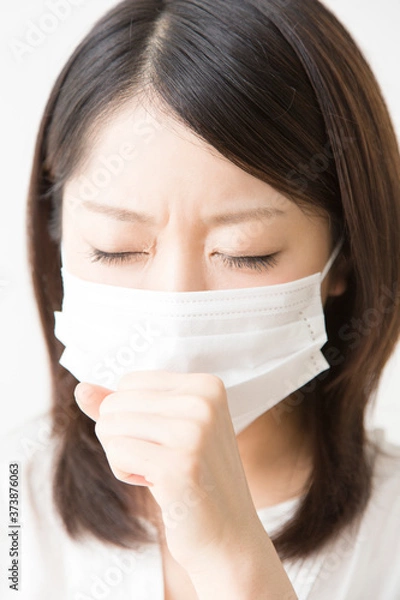 Fototapeta 咳をする女性