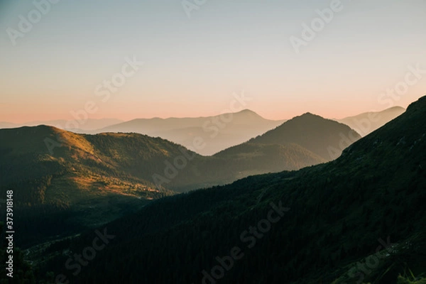 Fototapeta Amazing sunset in the wild ukrainian ridge Marmarosy, near Romania