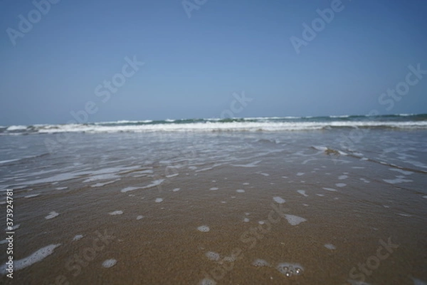 Obraz 晴れた日の波打つ海岸