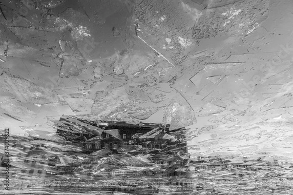 Fototapeta Vintage apartment house reflected in freezing Fontanka river