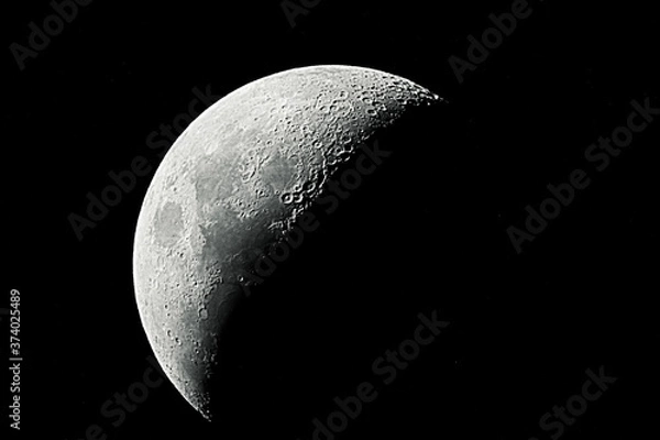 Fototapeta Waxing crescent moon as background