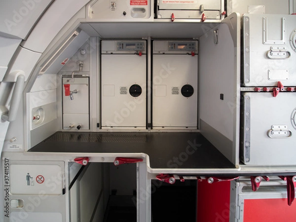 Fototapeta Aircraft aft galley with full of storage unit. The picture show how it look like. 