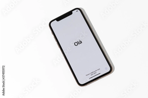 Fototapeta Welcome hello in different languages white screen on starting of the smartphone 