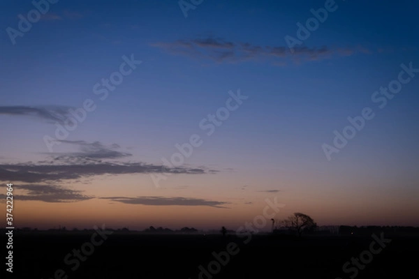 Fototapeta sunset in the clouds