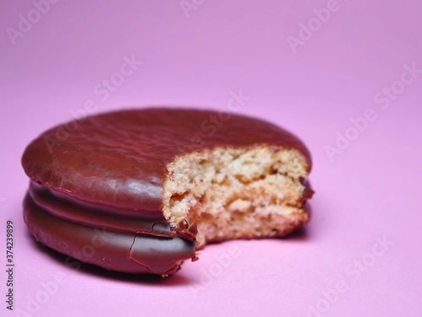Fototapeta Choco Pie Chocolate isolated on pink background. Choco Pie coated snack
