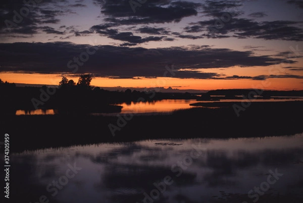 Fototapeta sunset over lake