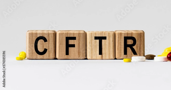 Fototapeta cubes with the word CFTR on them. Care concept.