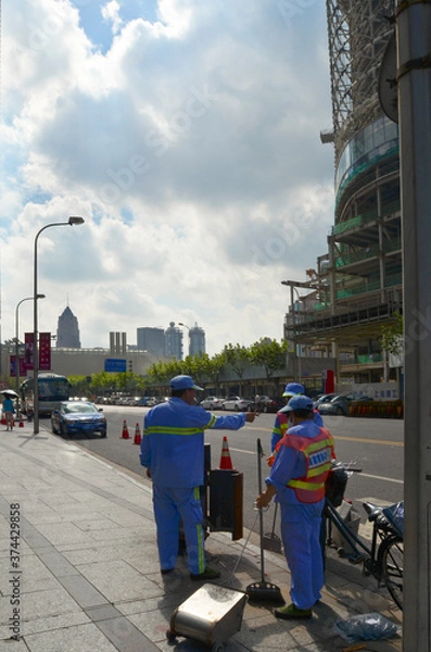 Fototapeta 街中の清掃員　上海　