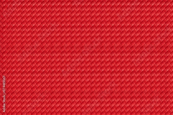 Obraz Red leather material background. Upholstery. Texture. Close-up