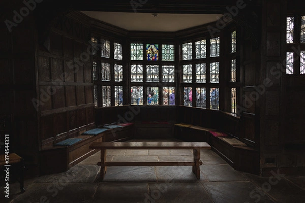 Obraz Tutor stained glass window in old building 