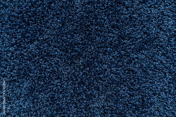 Fototapeta The texture of a blue carpet. Fleecy surface. Background