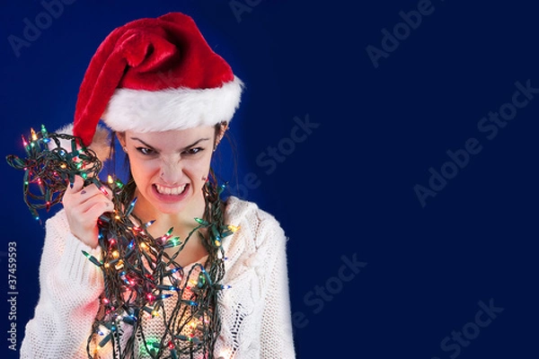 Obraz Panicked girl with Christmas lights