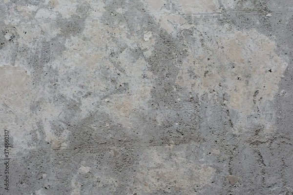 Fototapeta Old concrete surface with cracks and remnants of old paint