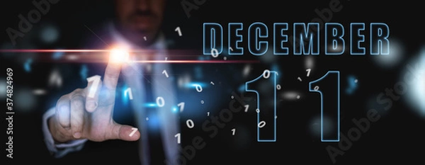 Obraz december 11th. Day 11 of month,advertising or high-tech calendar, man in suit presses bright virtual button winter month, day of the year concept