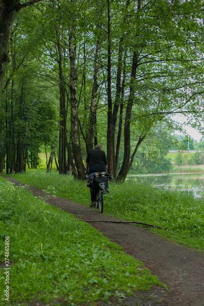 Obraz man riding a bike