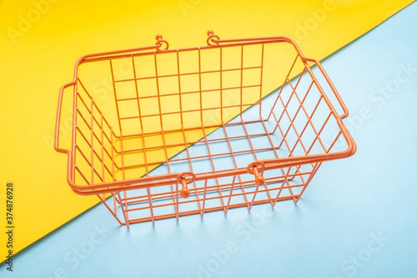 Fototapeta A shopping basket consumer shopping concept illustration on a stylish contrast color background