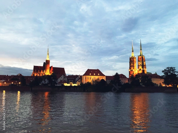 Fototapeta View on Church of the Holy Cross and St. Bartholomew, Odra river and Tumski Island, Wroclaw