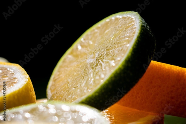 Obraz sliced lime and orange
