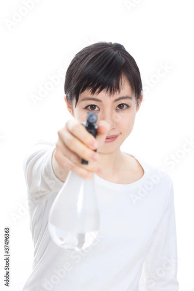Fototapeta スプレーを持った女性
