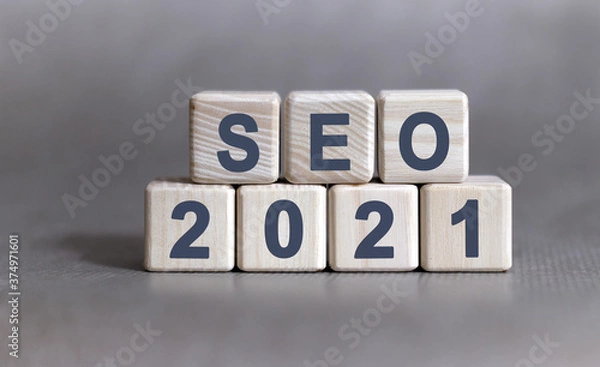 Obraz SEO text on wooden cubes on a monochrome background