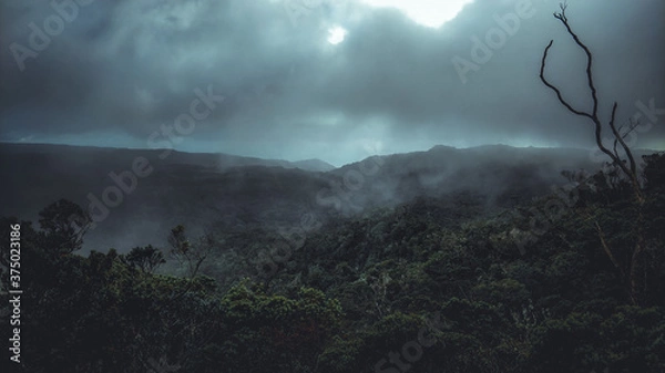 Obraz dramatic clouds over the mountains