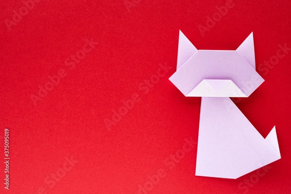 Obraz light purple origami cat on red background