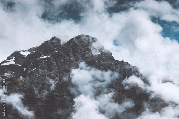Fototapeta Mountain between the Clouds