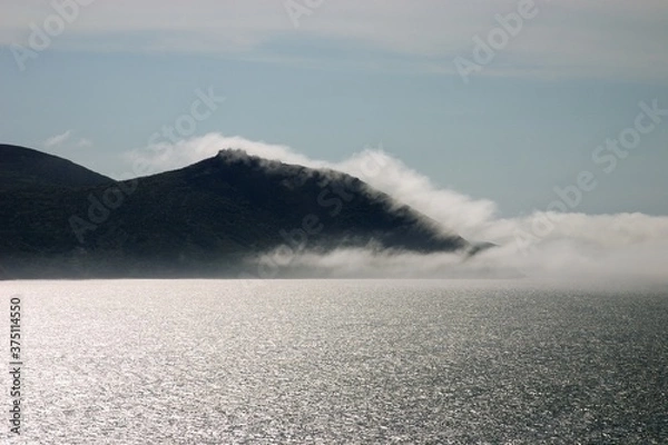 Fototapeta storm clouds over the mountains