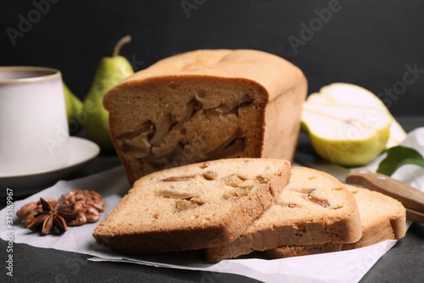Obraz Composition with tasty pear bread on black slate table, closeup. Homemade cake