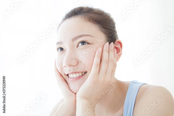 Fototapeta 頬杖をつく女性