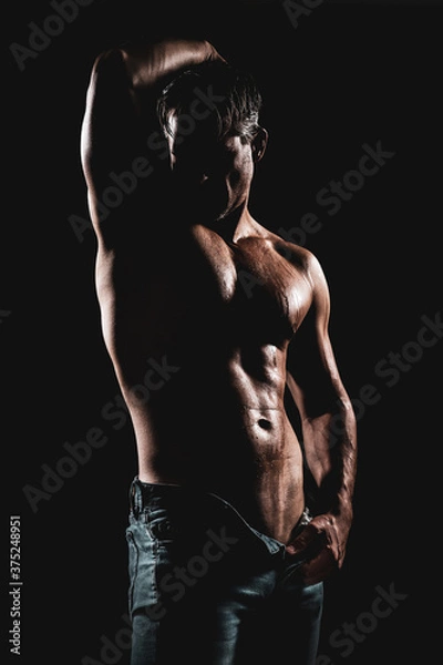 Obraz Lowkey man portrait of a muscular body