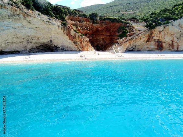 Fototapeta Sea cave at Porto Katsiki beach in Ionian sea in western Greece. Tourists visit western Greek island for its natural mountainous and Ionian seascape.