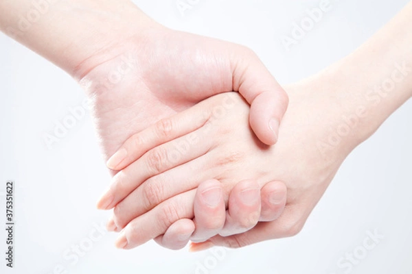 Fototapeta 手を繋ぐ男女
