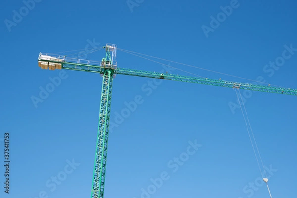Fototapeta Green construction crane