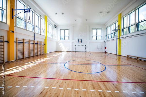 Fototapeta Empty european gym class for school sports for football, basketball and handball