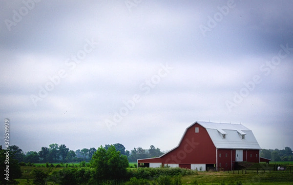 Obraz red barn and blue sky