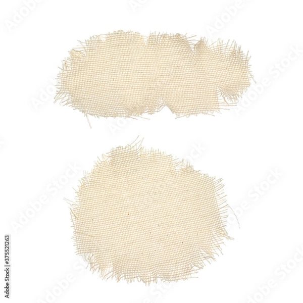 Obraz Round and oval pieces, scraps of the old fabric of their canvas. The patch, cloth, garbage, dry waste, scraps of clothing. Texture background fabric in beige color isolated on a white background.