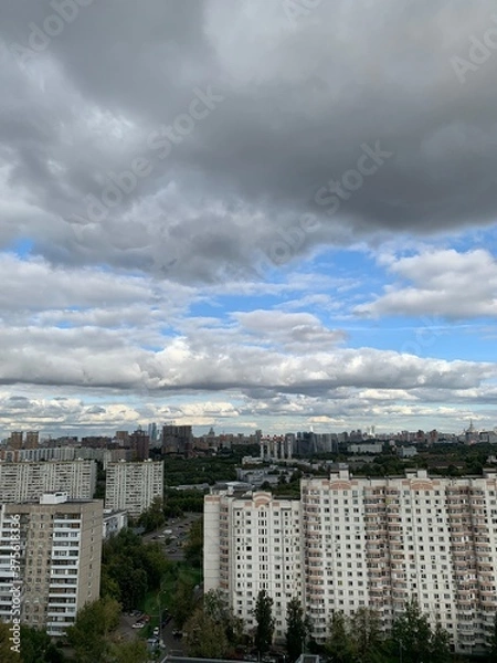 Obraz clouds over the city