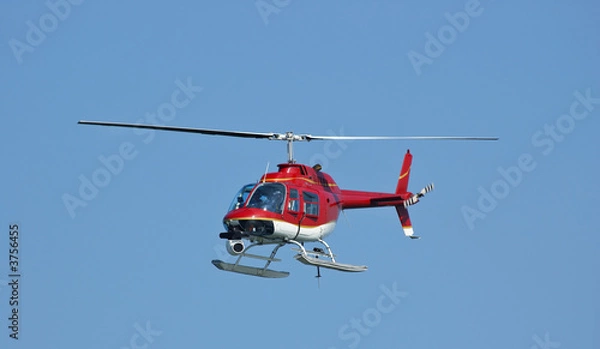 Obraz Jasnoczerwony helikopter z aparatem.