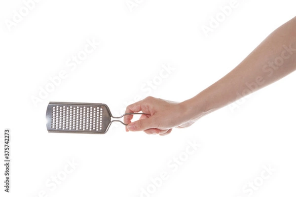 Obraz hand holding cheese grinder.