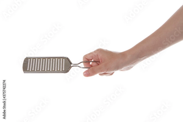 Obraz hand holding cheese grinder.