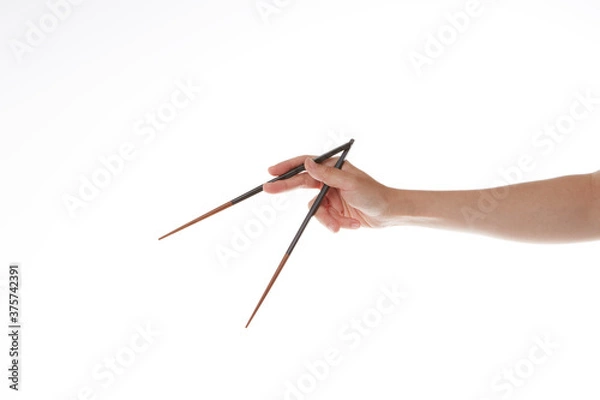 Obraz use wooden chopsticks.