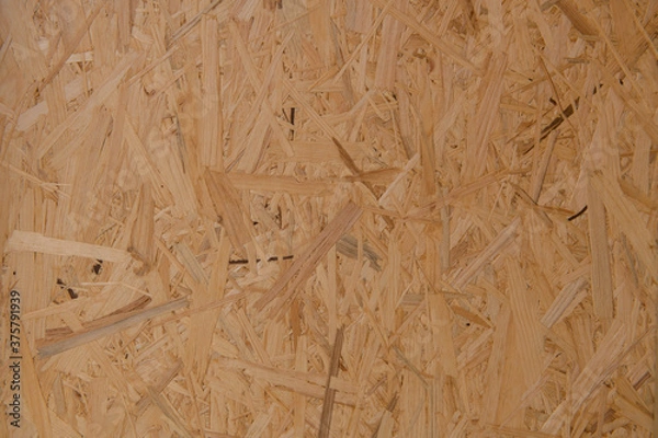 Fototapeta Background or Texture of a Wooden Oriented Strand Board (OSB)