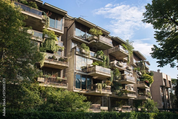Obraz Green residential building. Vertical Forest, condominium in Udine (Italy) with a lot of plants