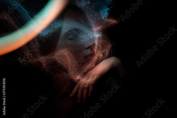 Obraz lightpainting portrait, new art direction, long exposure photo without photoshop, light drawing at long exposure